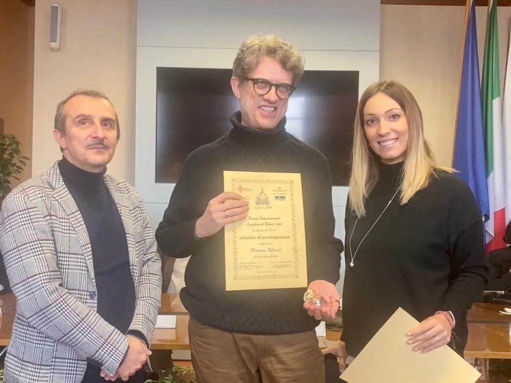 Il presidente Milani col vincitore e Bianca Guscelli